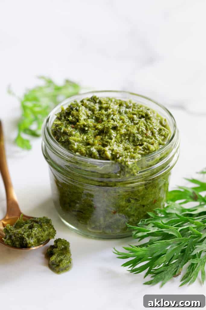 Photo of Carrot Top Salsa Verde in glass jar, ready to be served.
