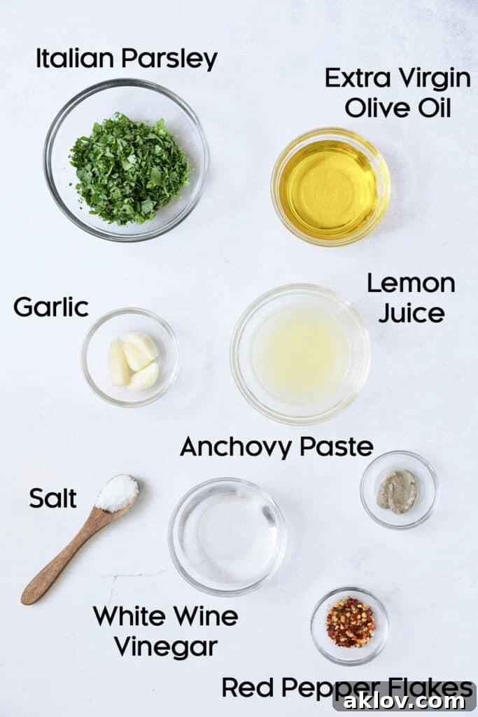 Photo of all ingredients for Carrot Top Salsa Verde laid out in glass bowls.