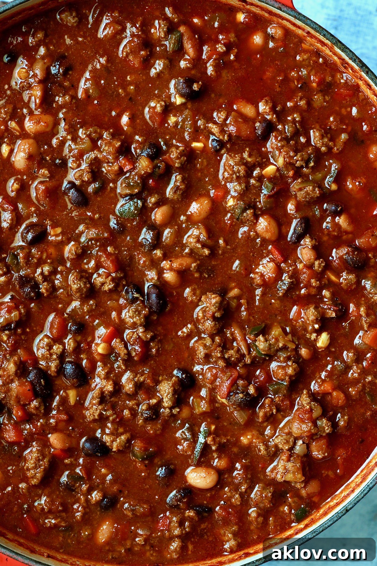 Finished chili in red Dutch oven.