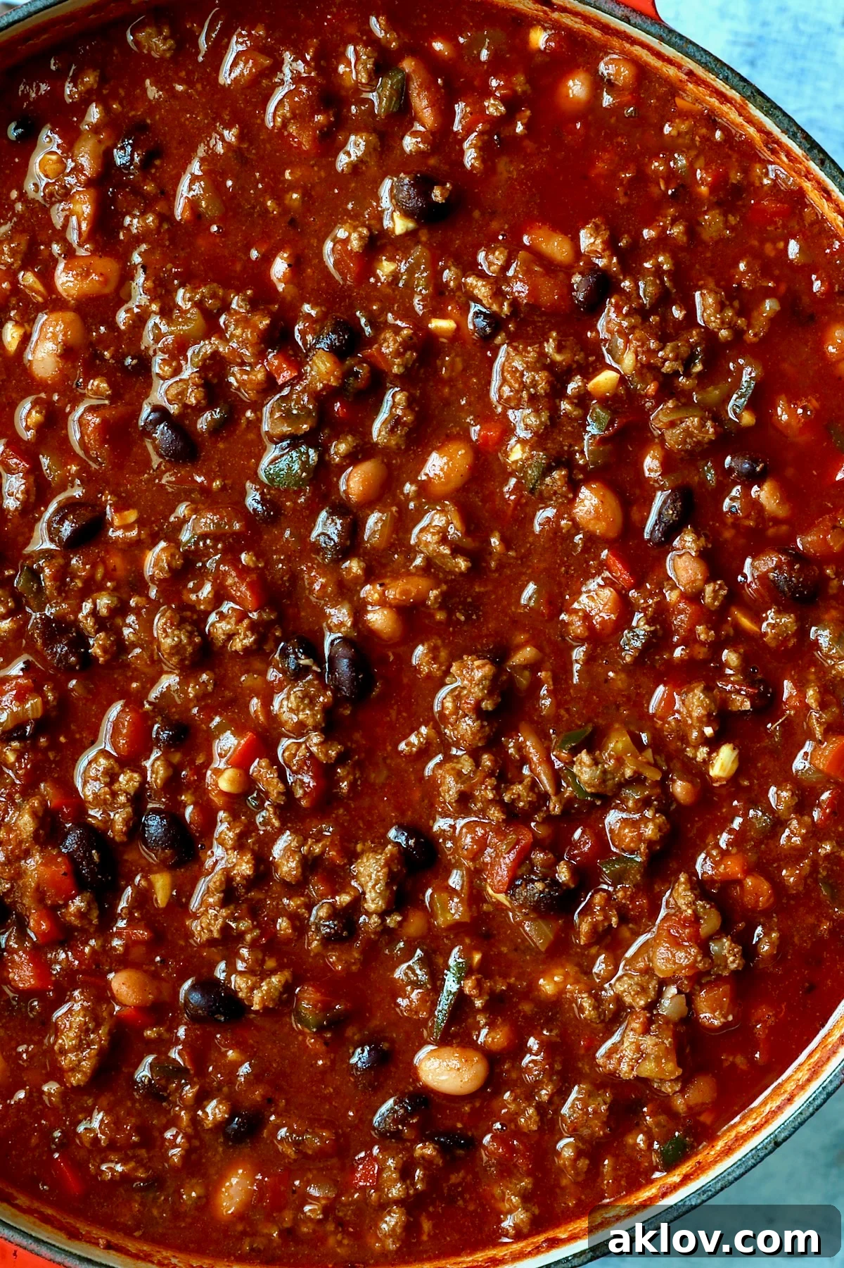 Finished chili in red Dutch oven.
