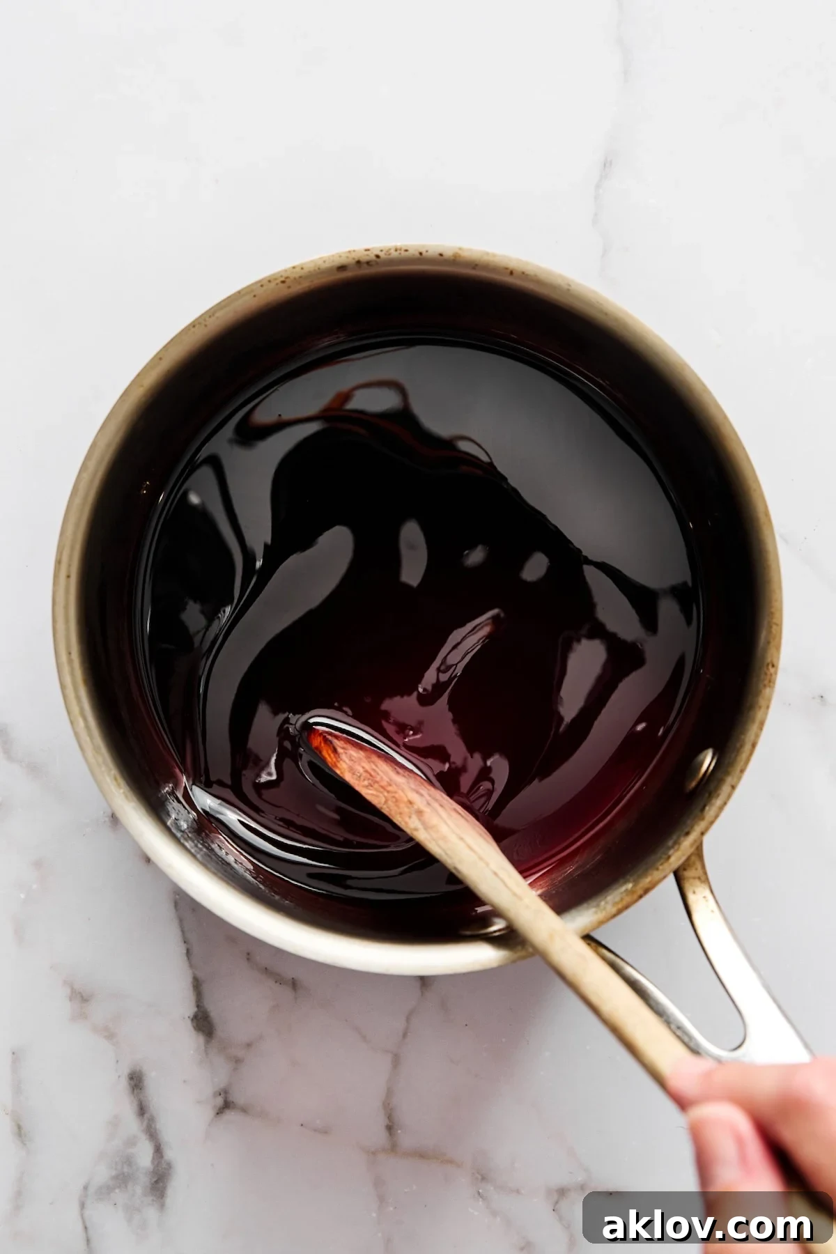 Reduced red wine sauce for pears.