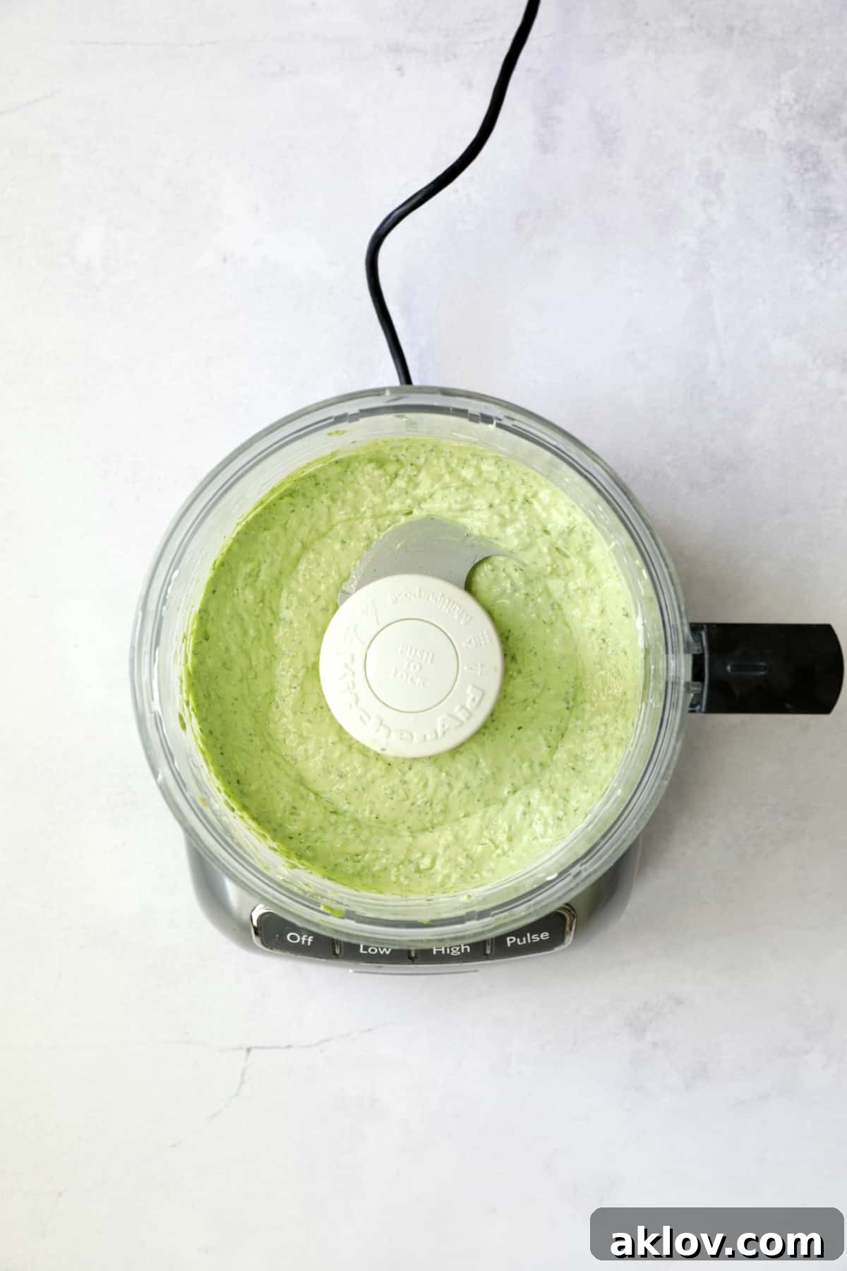 Avocado-Cilantro Sour Cream in food processor.