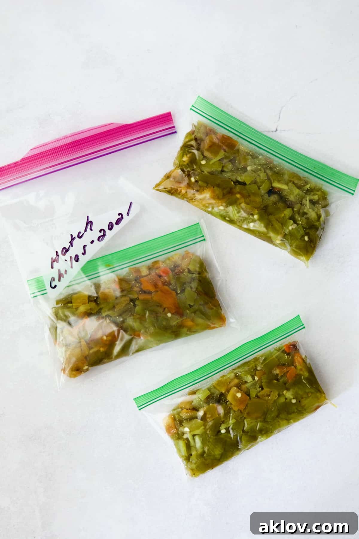 Diced, roasted Hatch green chiles in small freezer bags.