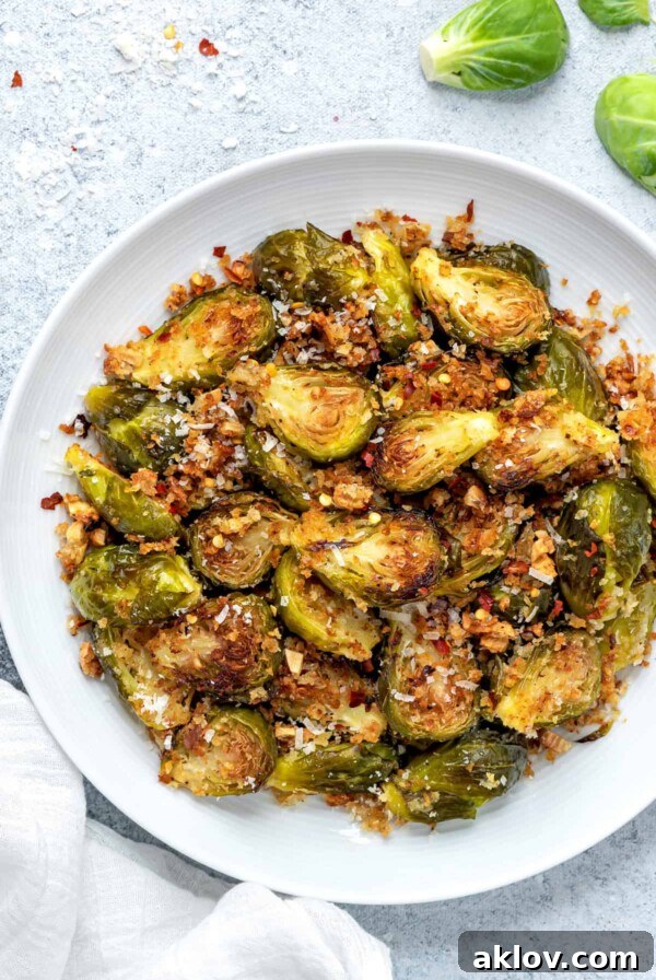 Crispy Roasted Brussels Sprouts with Garlic and Parmesan, showcasing golden-brown, charred edges.