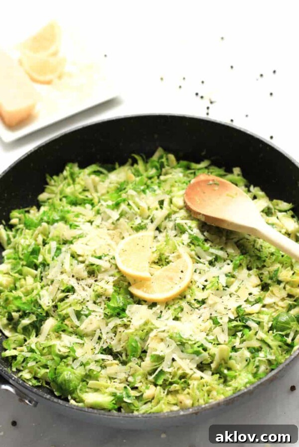 Sautéed Shredded Brussels Sprouts with Lemon and Parmesan, showing finely shredded sprouts.