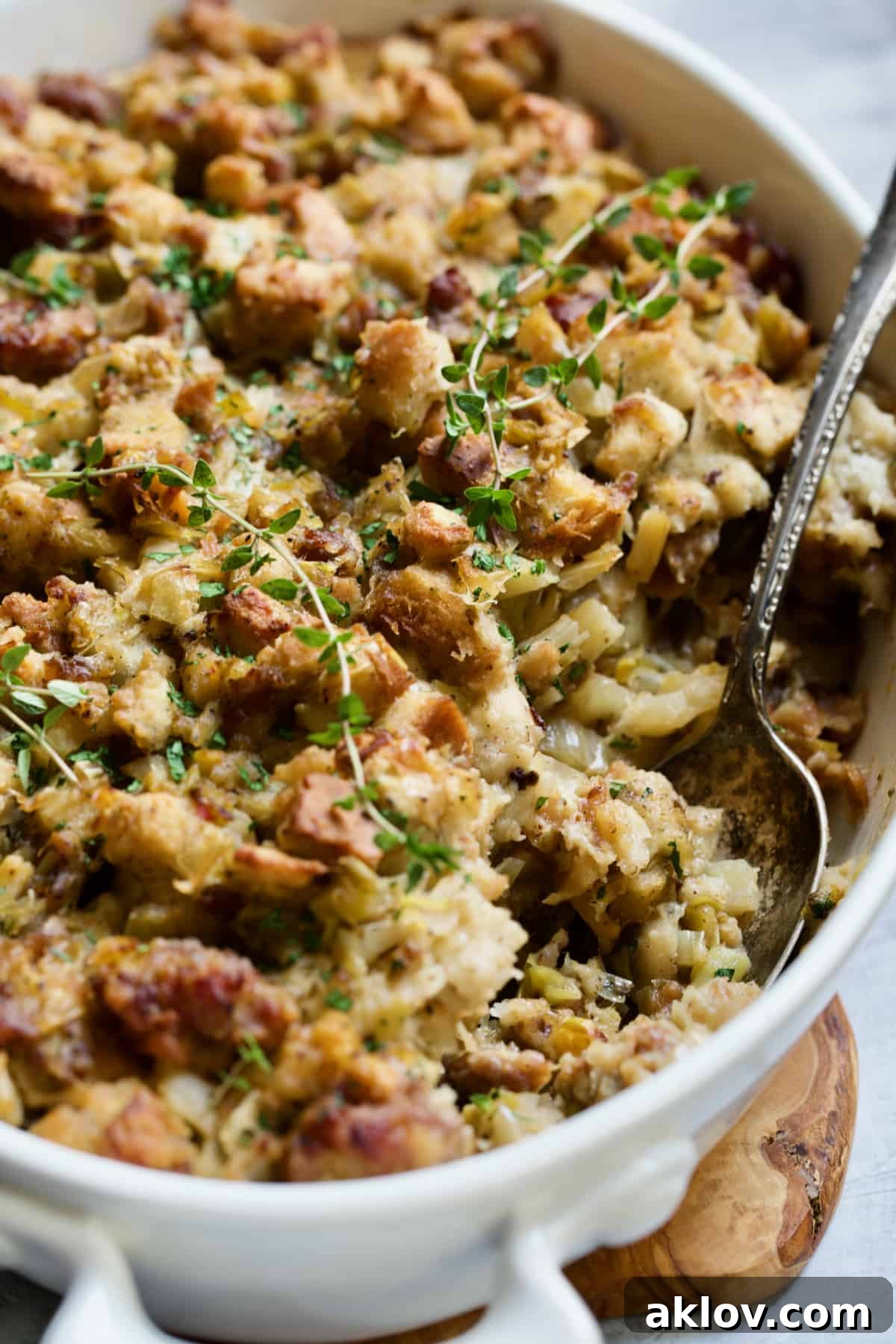 Aromatic Fennel and Leek Sausage Stuffing 3 Sausage Stuffing with Fennel and Leeks in a pristine white oval gratin dish, ready to be served.