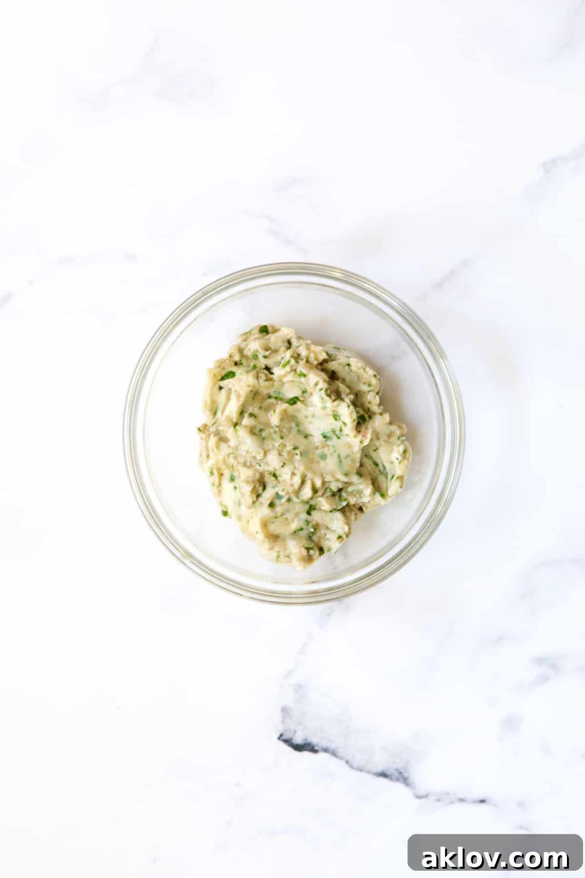 A bowl of freshly prepared anchovy butter, rich and ready to accompany the lamb.