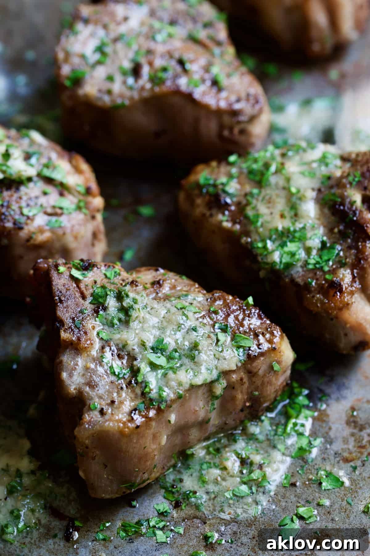 Seared Lamb Chops served with a generous dollop of Anchovy Butter.