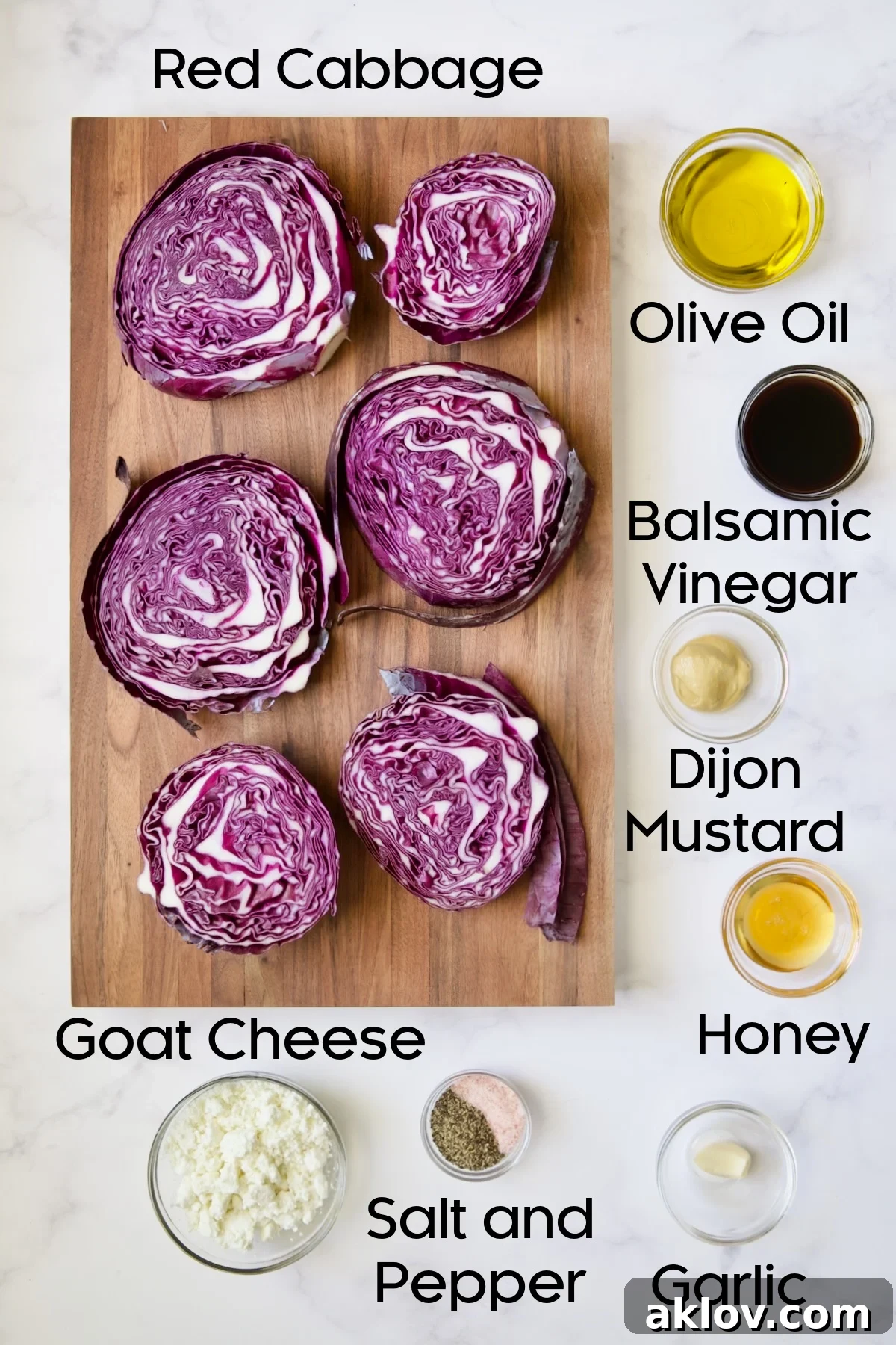 Ingredients for Roasted Red Cabbage Steaks with Balsamic Vinaigrette and Goat Cheese in glass bowls.