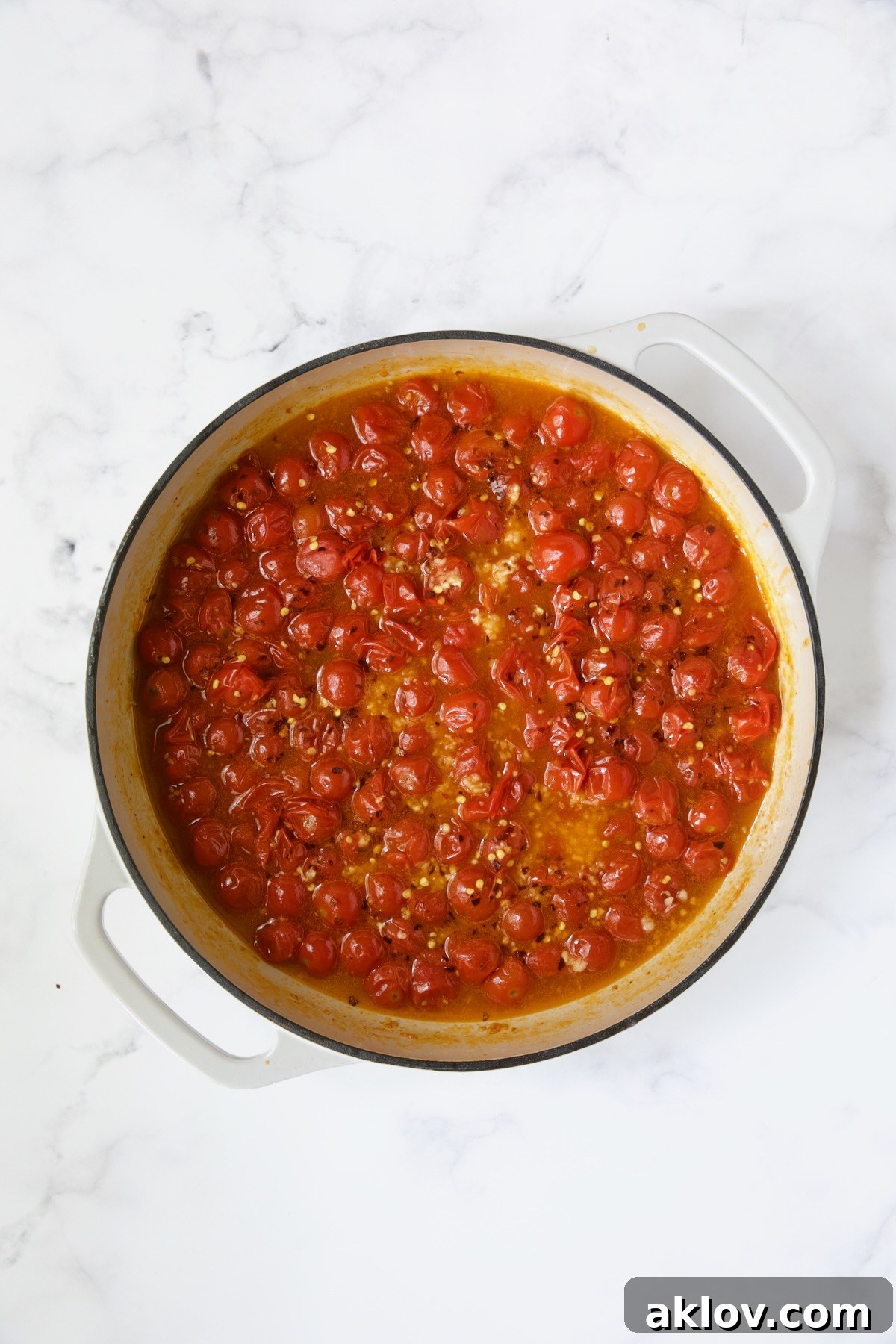 Cherry tomatoes with crushed red pepper flakes added.