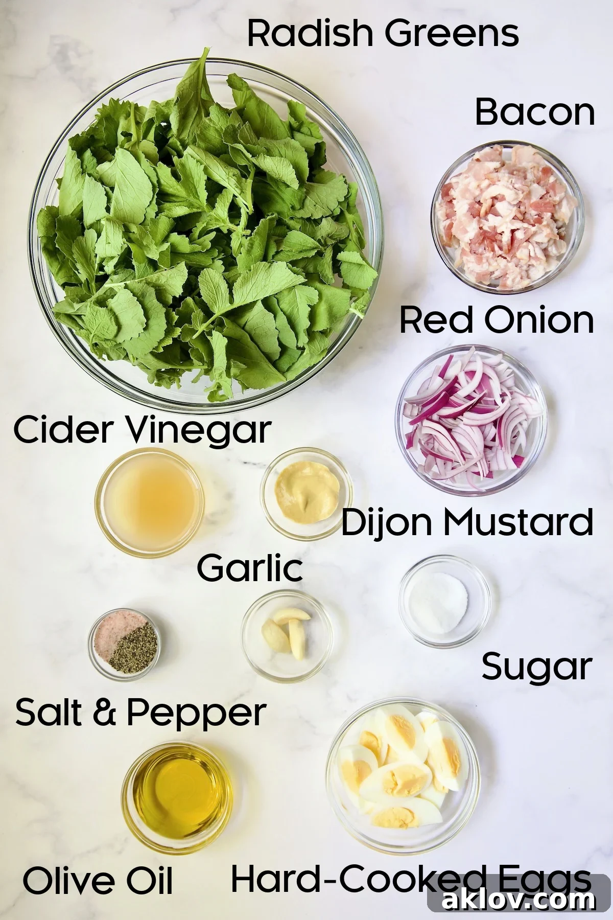 All the fresh ingredients for Radish Greens Salad with Hot Bacon Dressing displayed in glass bowls.
