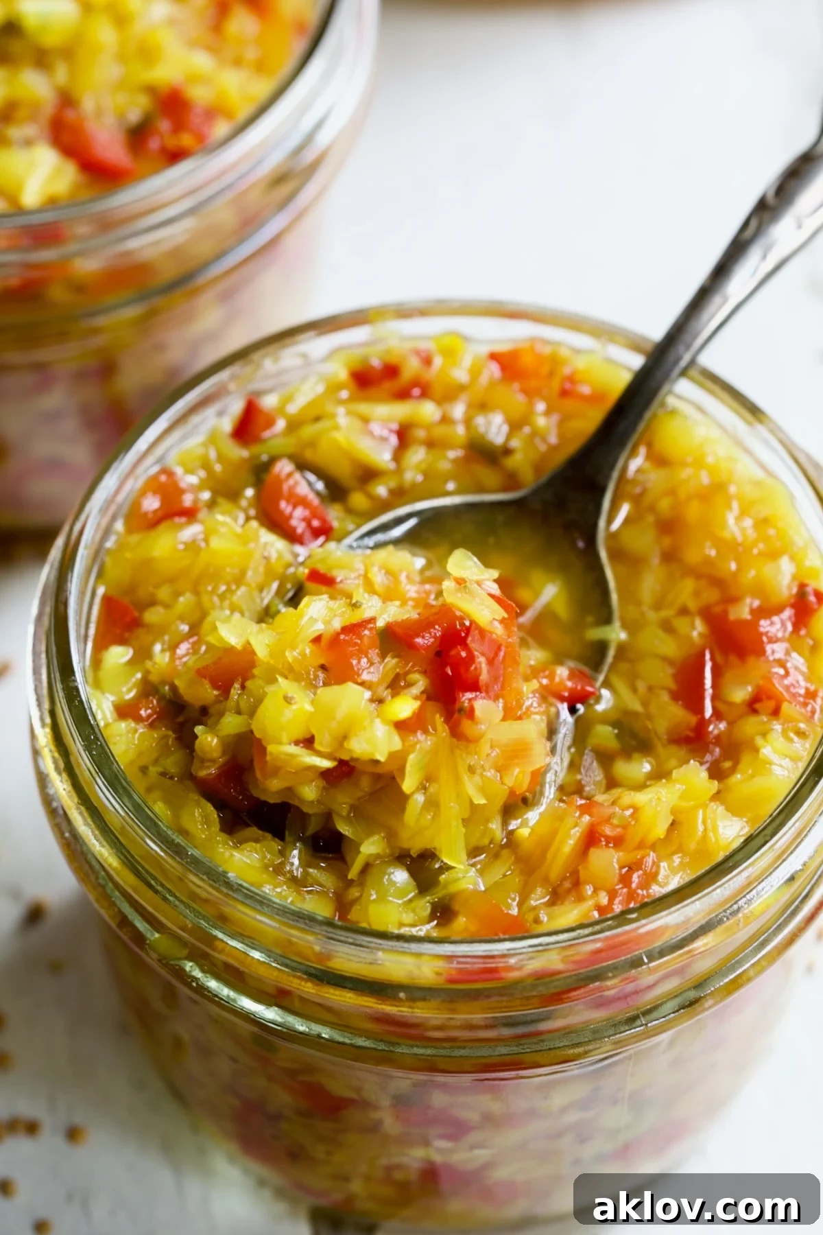 Fiery Ramp Relish 3 A glass jar filled with vibrant Ramp and Pepper Relish, ready for enjoyment.