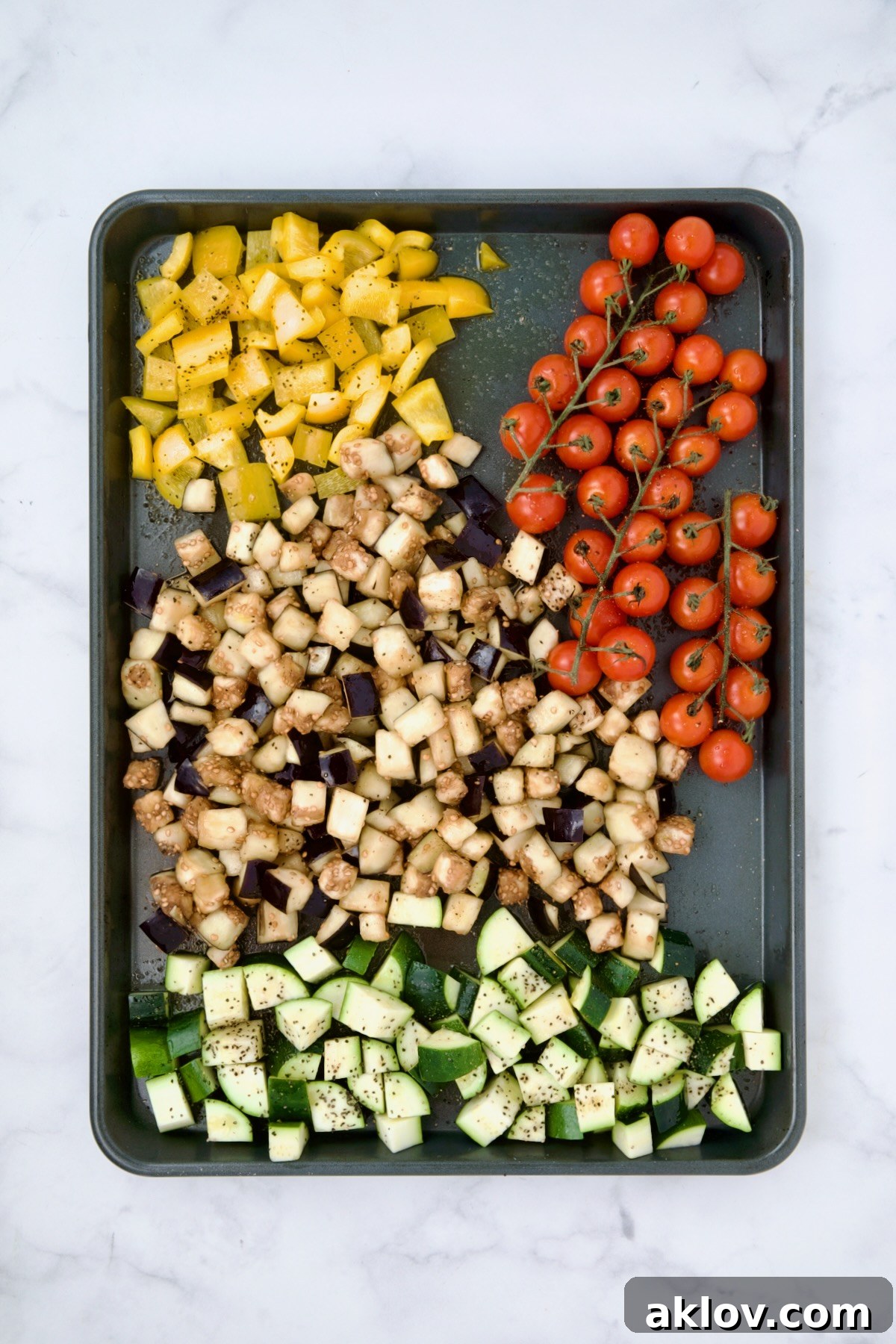 Vegetables for galette on rimmed sheet pan before being roasted.