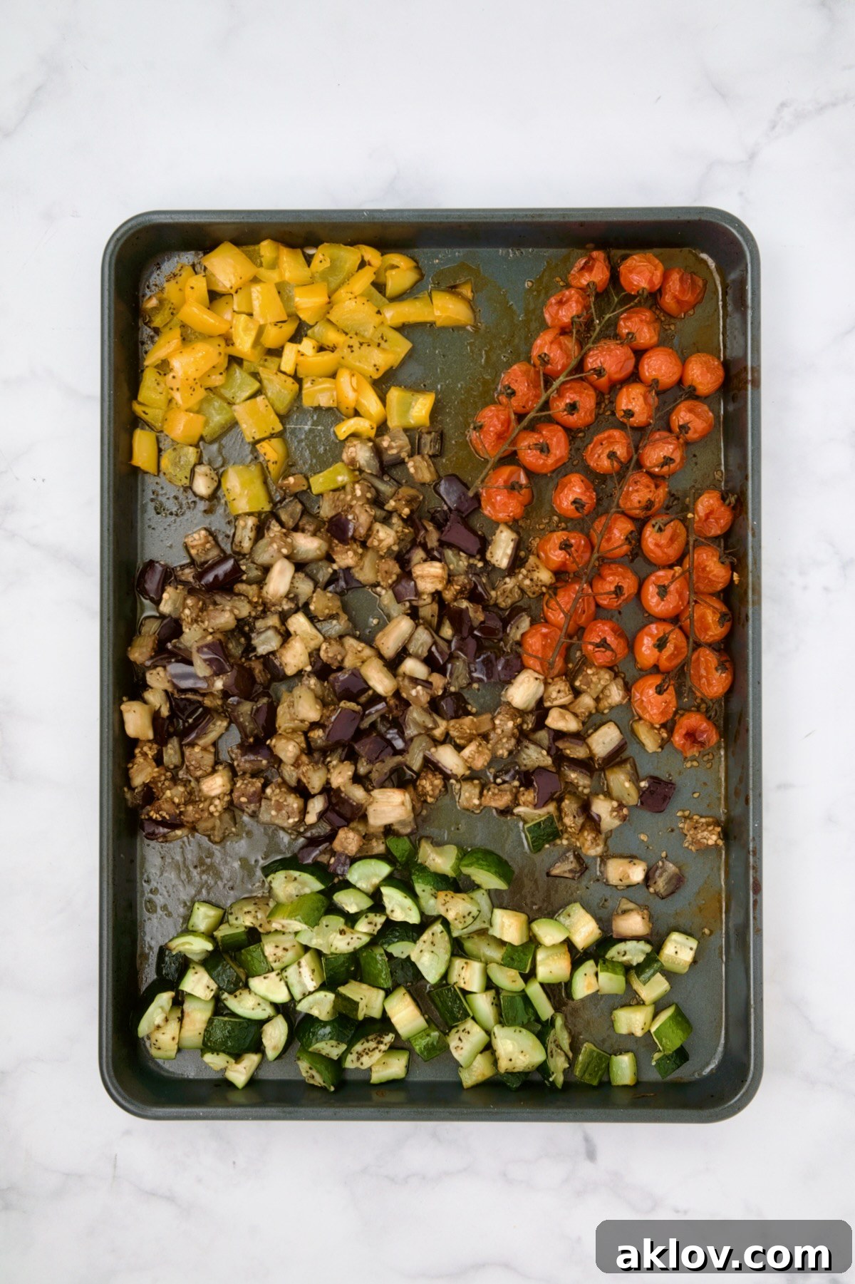 Vegetables for galette on rimmed sheet pan after being roasted.