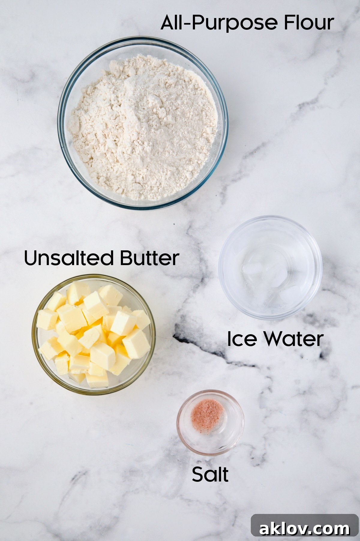 Ingredients for pastry dough in glass bowls.