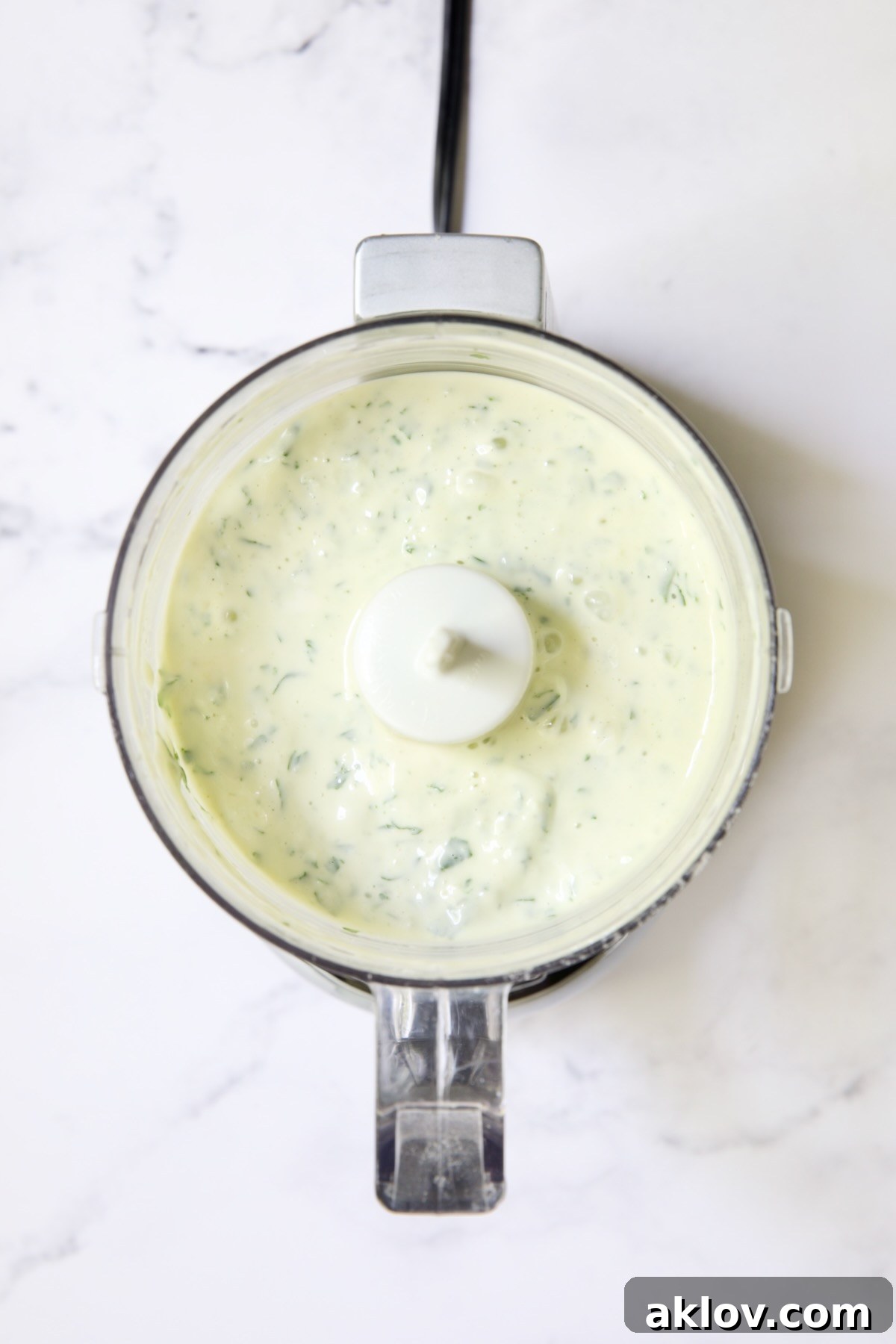 Garlic Basil Aioli in mini food processor.