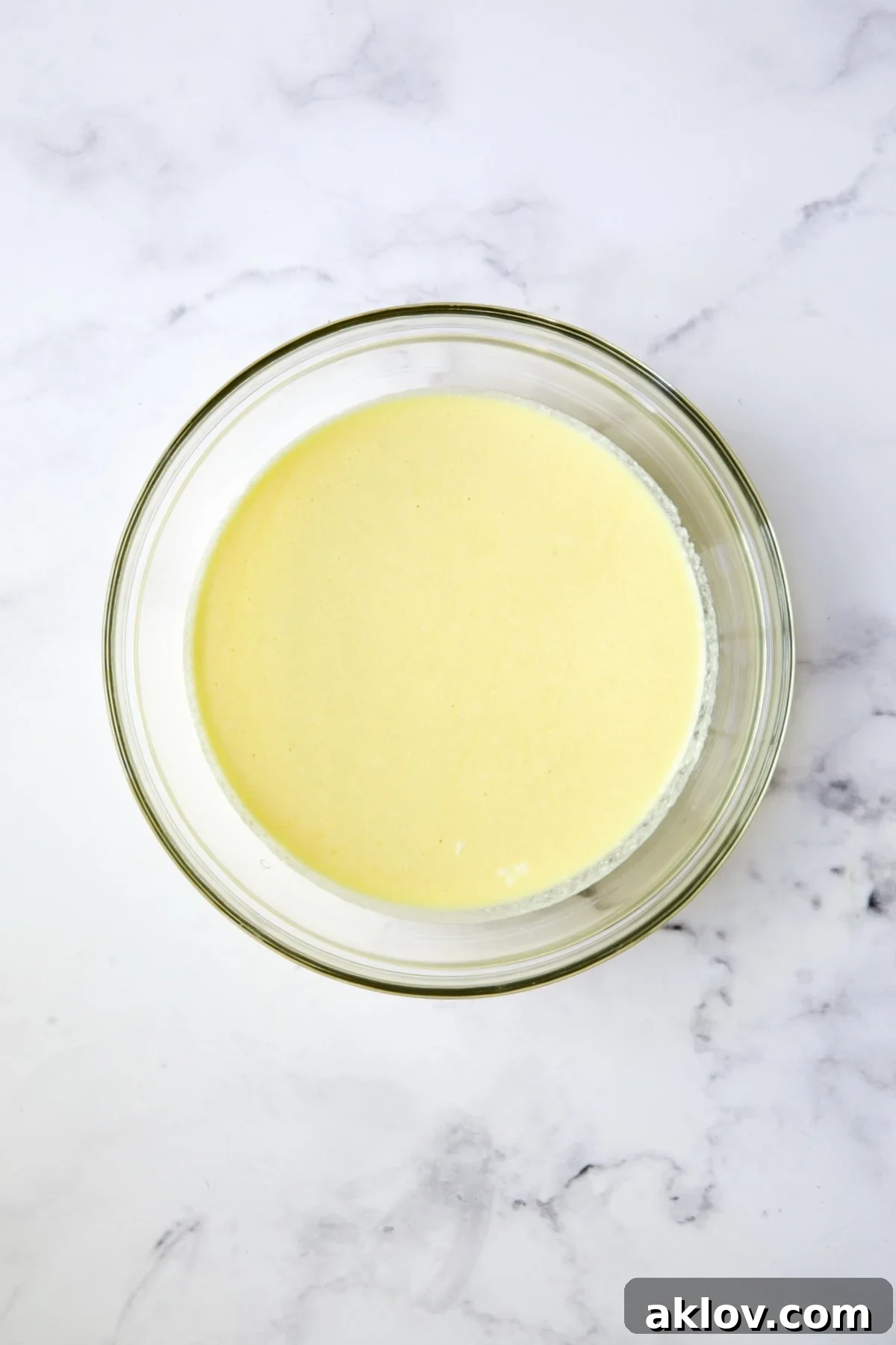 Ricotta and egg combination in glass bowl.