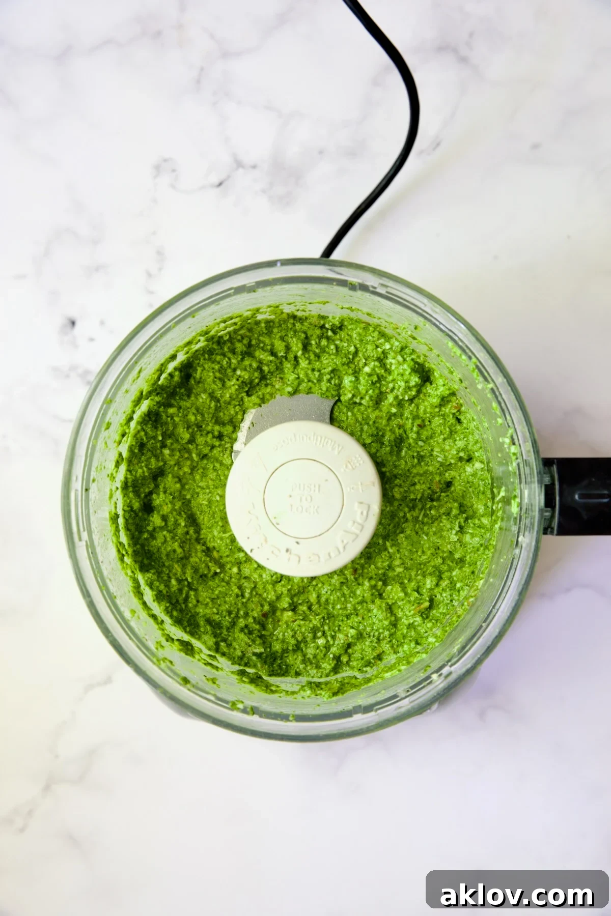 Finished pesto in food processor.