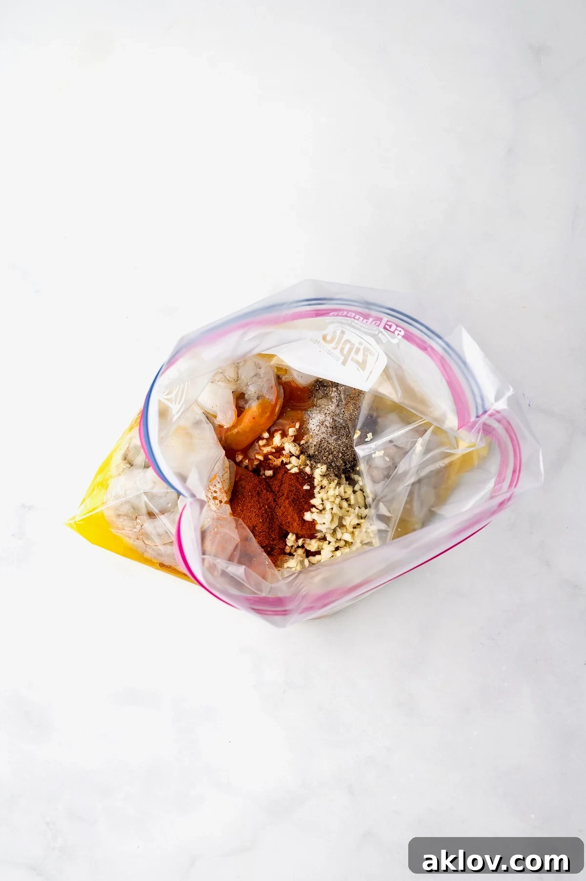 Shrimp happily marinating in a zipper-top bag, absorbing all the delicious flavors.