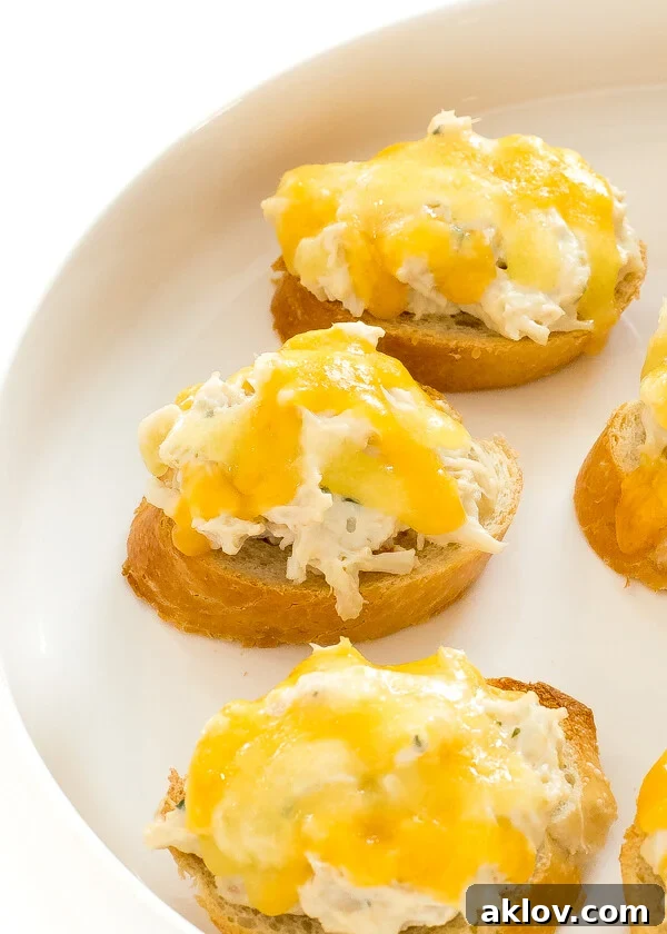 Crab Toast on white plate.