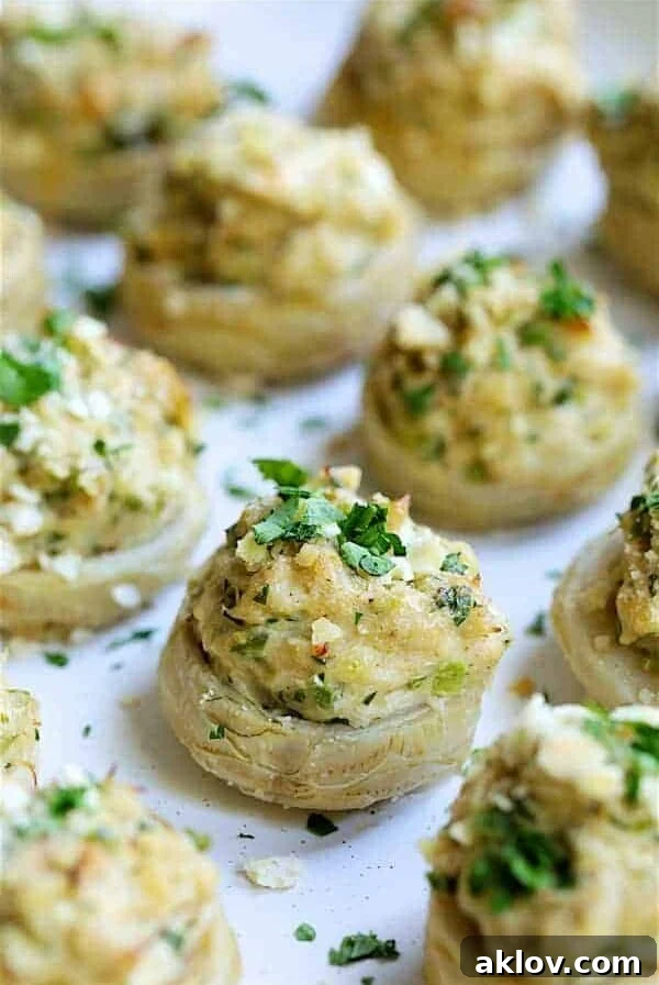 Deviled Crab Stuffed Artichoke Bottoms on white platter.