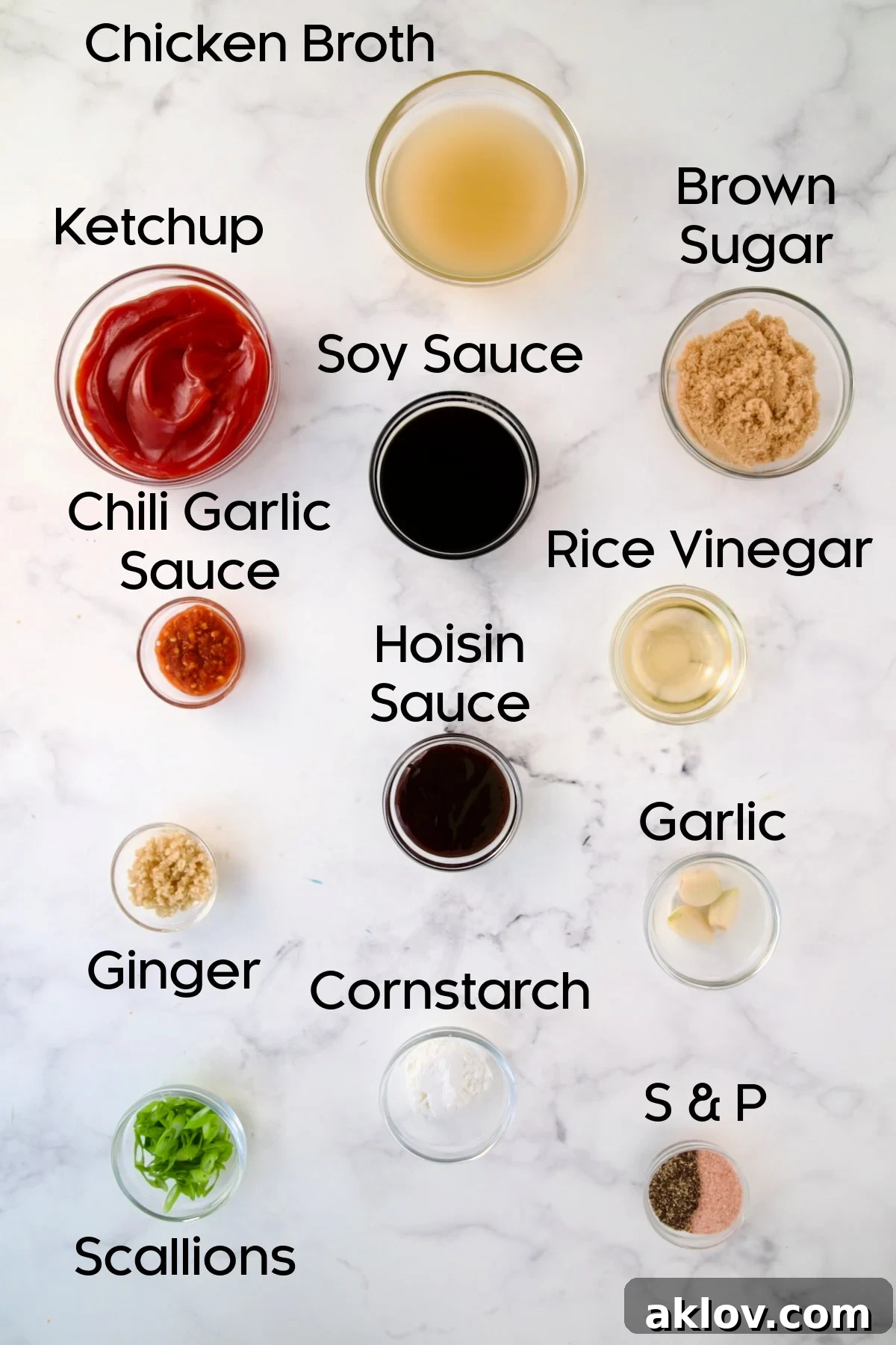 More ingredients for Asian Chicken Meatballs, including sauces and spices, in glass bowls.