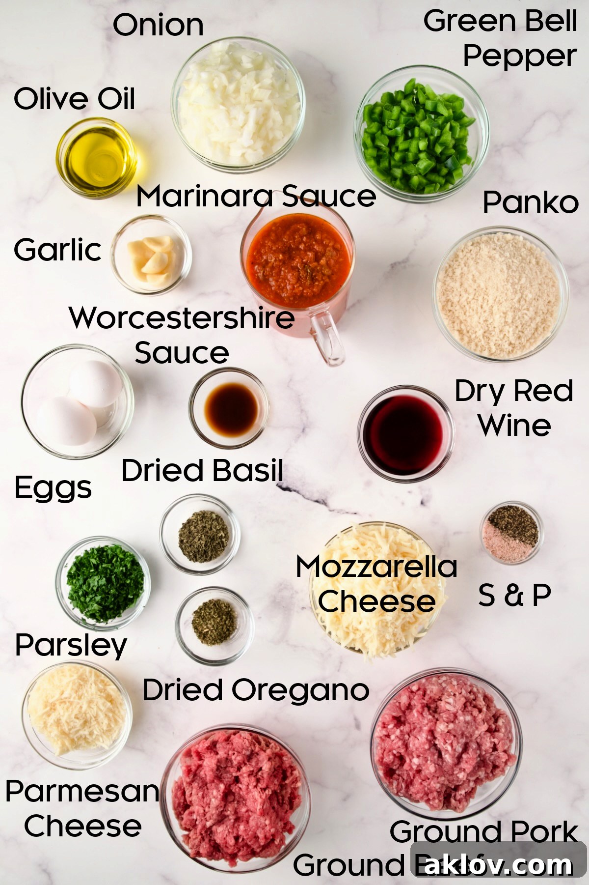 A collection of ingredients for Italian Meatloaf, neatly arranged in glass bowls.