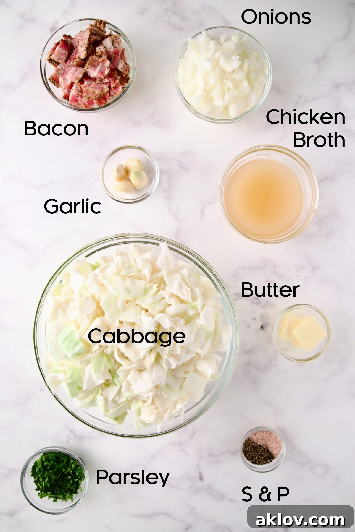 Ingredients for Fried Cabbage with Bacon in glass bowls.