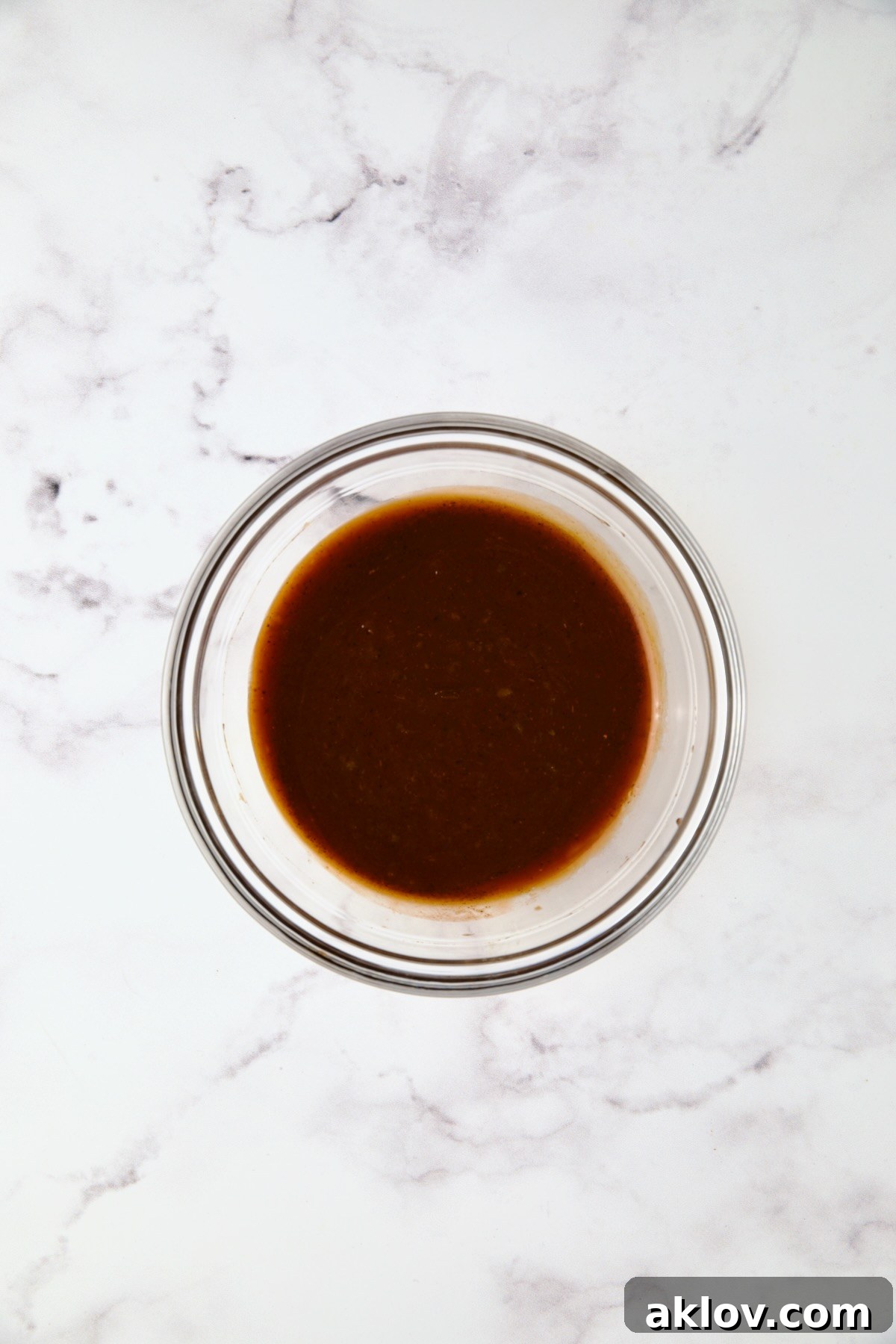 Barbecue sauce in glass bowl.