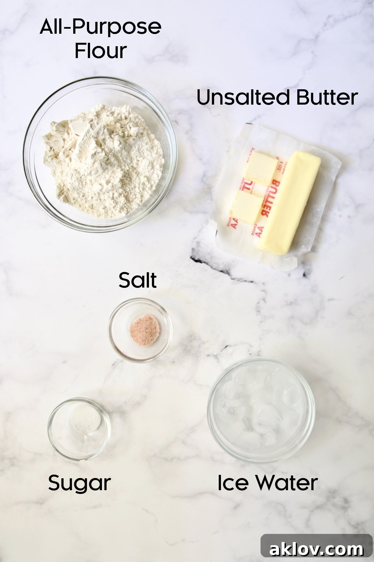 Ingredients for crust for Tomato Tart with Ricotta and Basil in glass bowls.