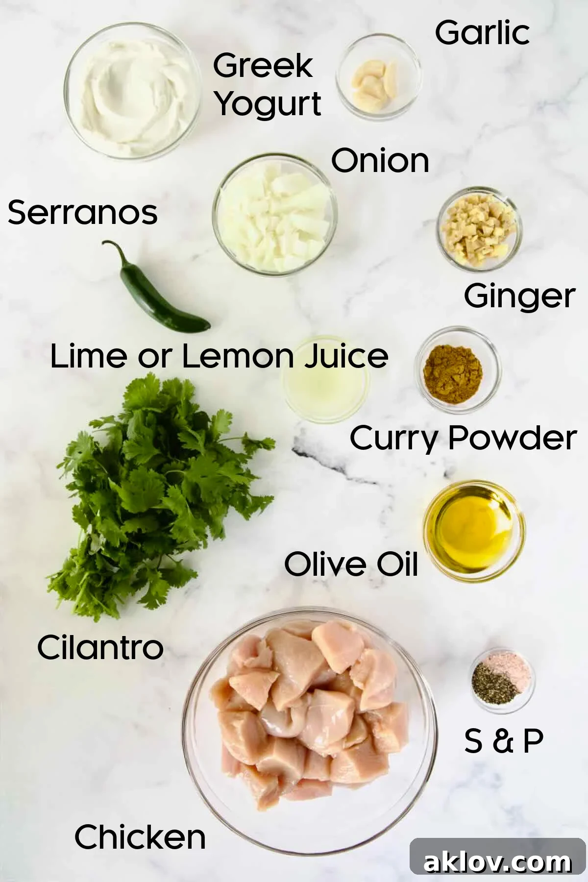 Ingredients for Yogurt Marinated Grilled Chicken Skewers in glass bowls.