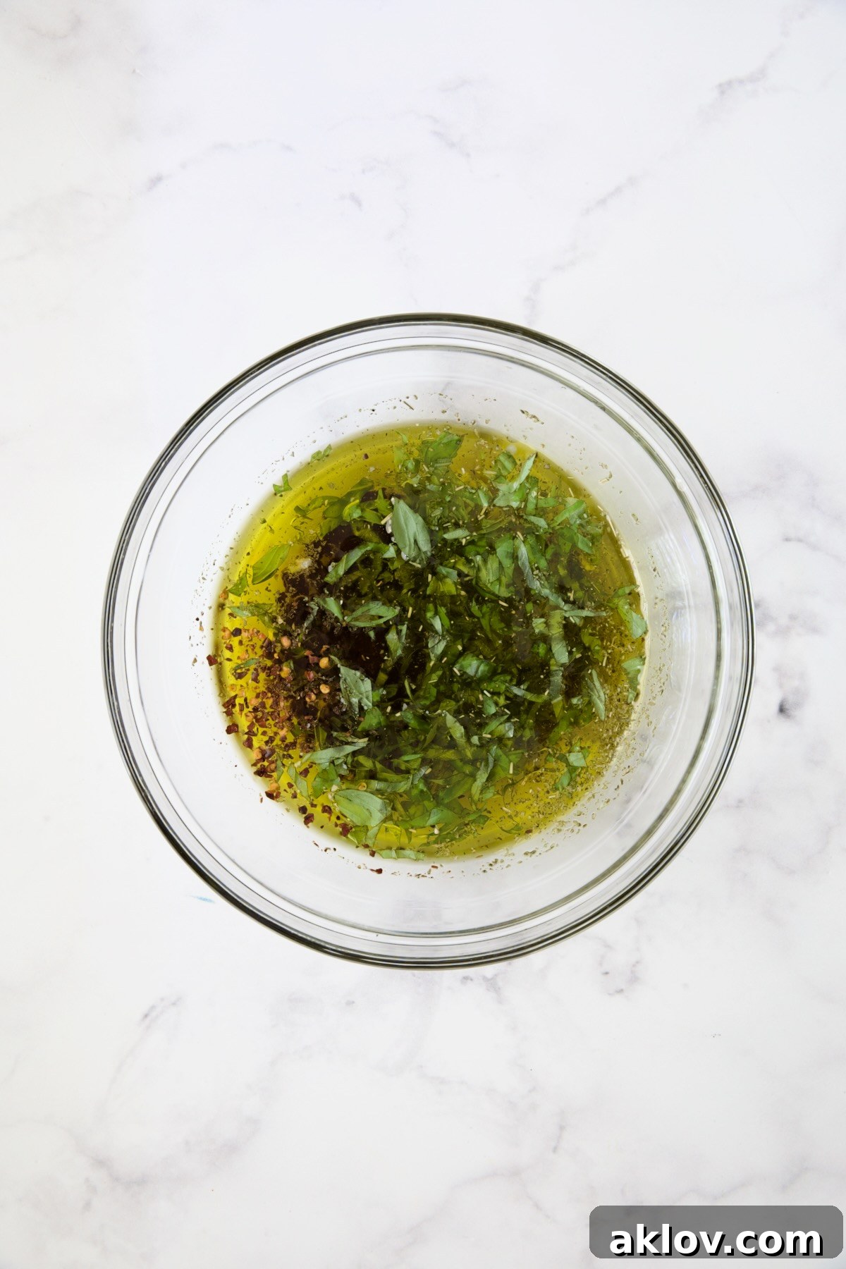 Marinade for Mozzarella Balls in glass bowl.