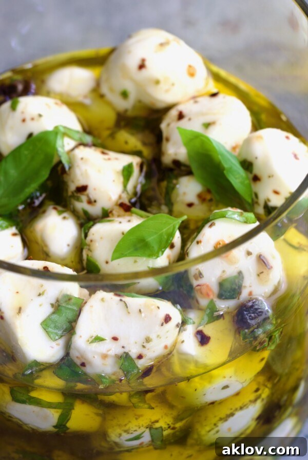 Marinated Mozzarella Balls in glass jar.