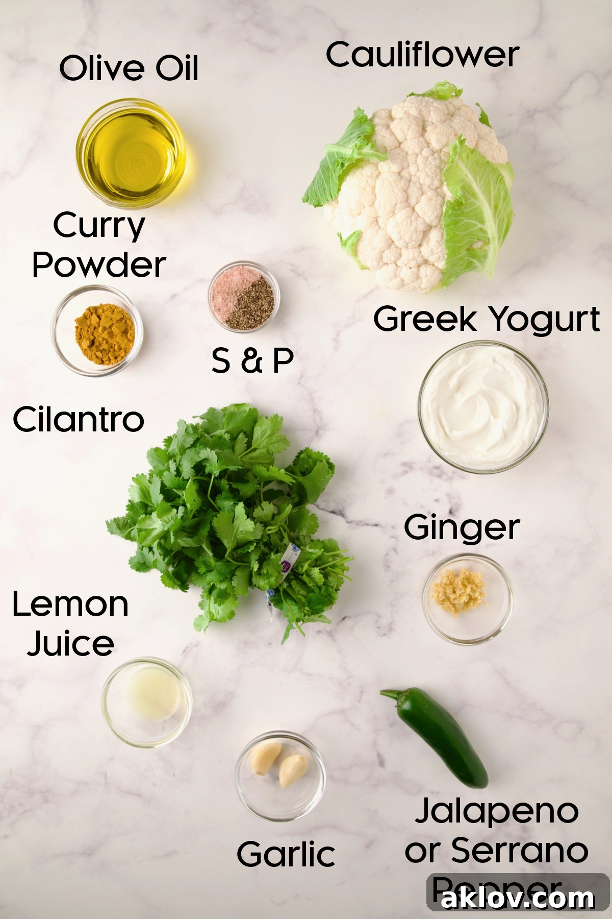Ingredients for Curry Roasted Cauliflower Wedges with Cilantro Chutney in glass bowls.