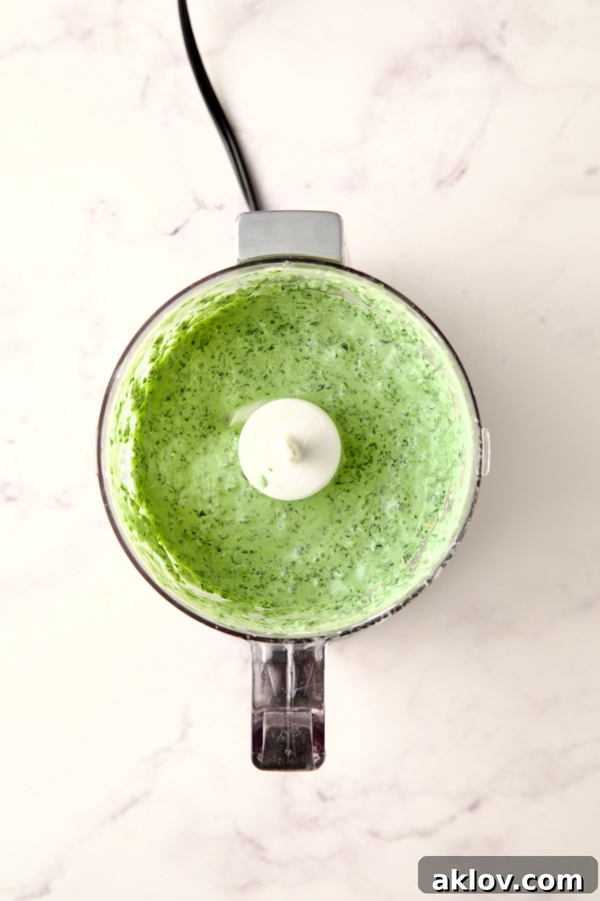 Cilantro chutney in mini food processor.
