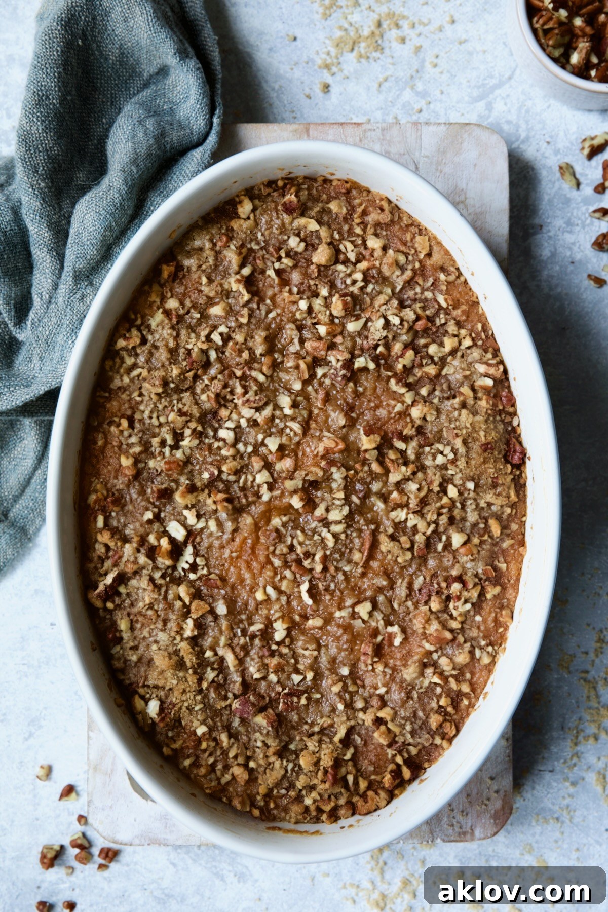 A perfectly baked Sweet Potato Souffle, golden brown with a crisp pecan streusel, fresh out of the oven.