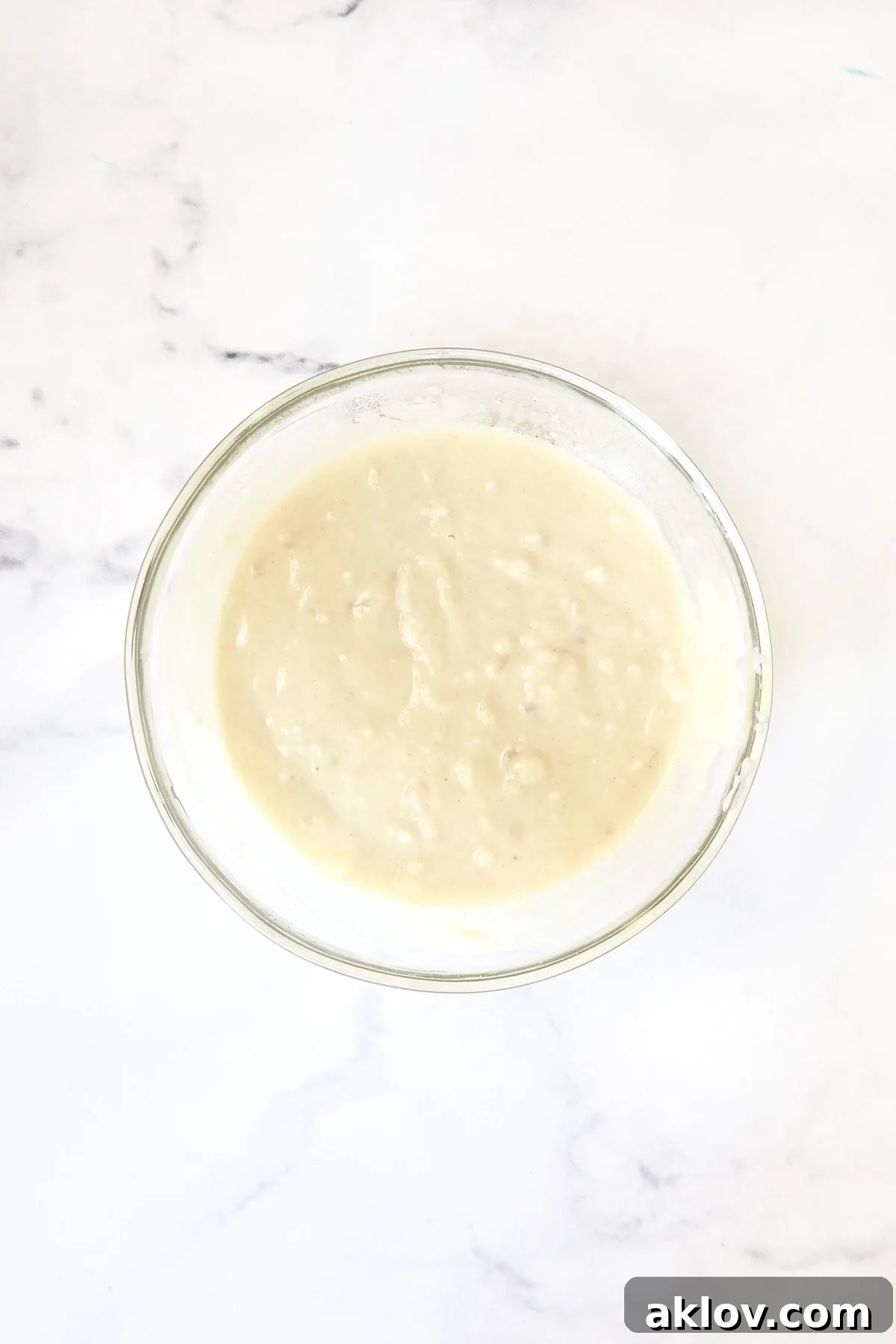 Glass bowl with flour slurry.