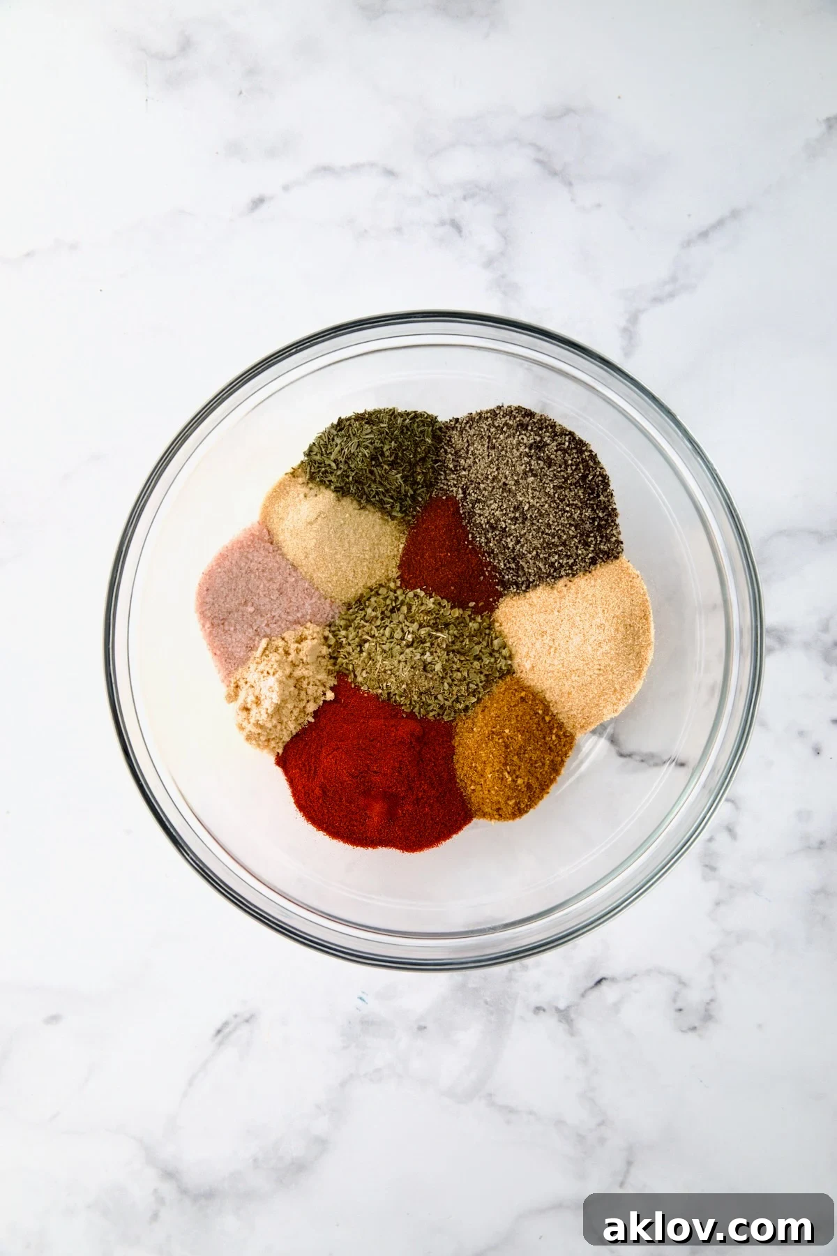 Blackening Seasoning ingredients in glass bowl before being mixed together.