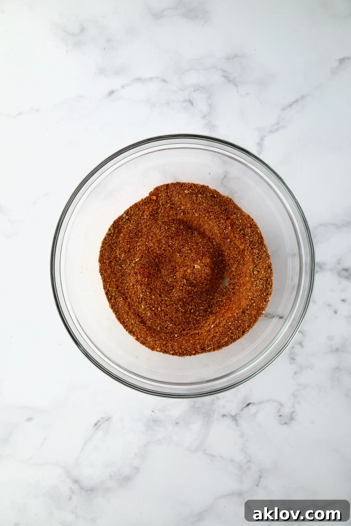 Blackening Seasoning ingredients in glass bowl after being mixed together.