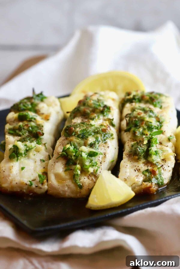 Broiled Halibut with Gremolata, a simple yet elegant fish dish garnished with fresh herbs.