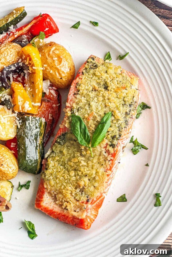 Easy Oven-Baked Basil Pesto Crusted Salmon on a plate, featuring tender fillets with a flavorful pesto crust and crispy panko breadcrumbs.
