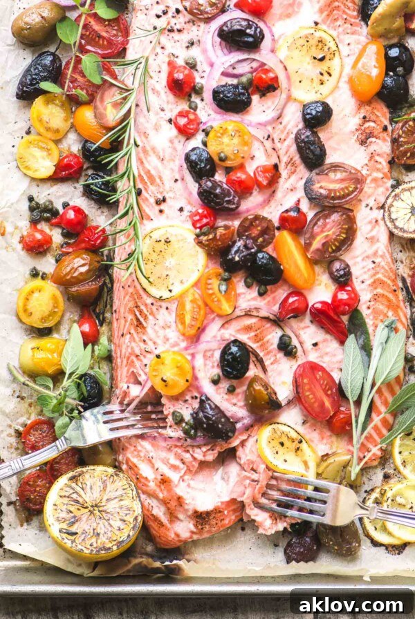 Mediterranean Sheet Pan Roasted Salmon with colorful roasted vegetables.