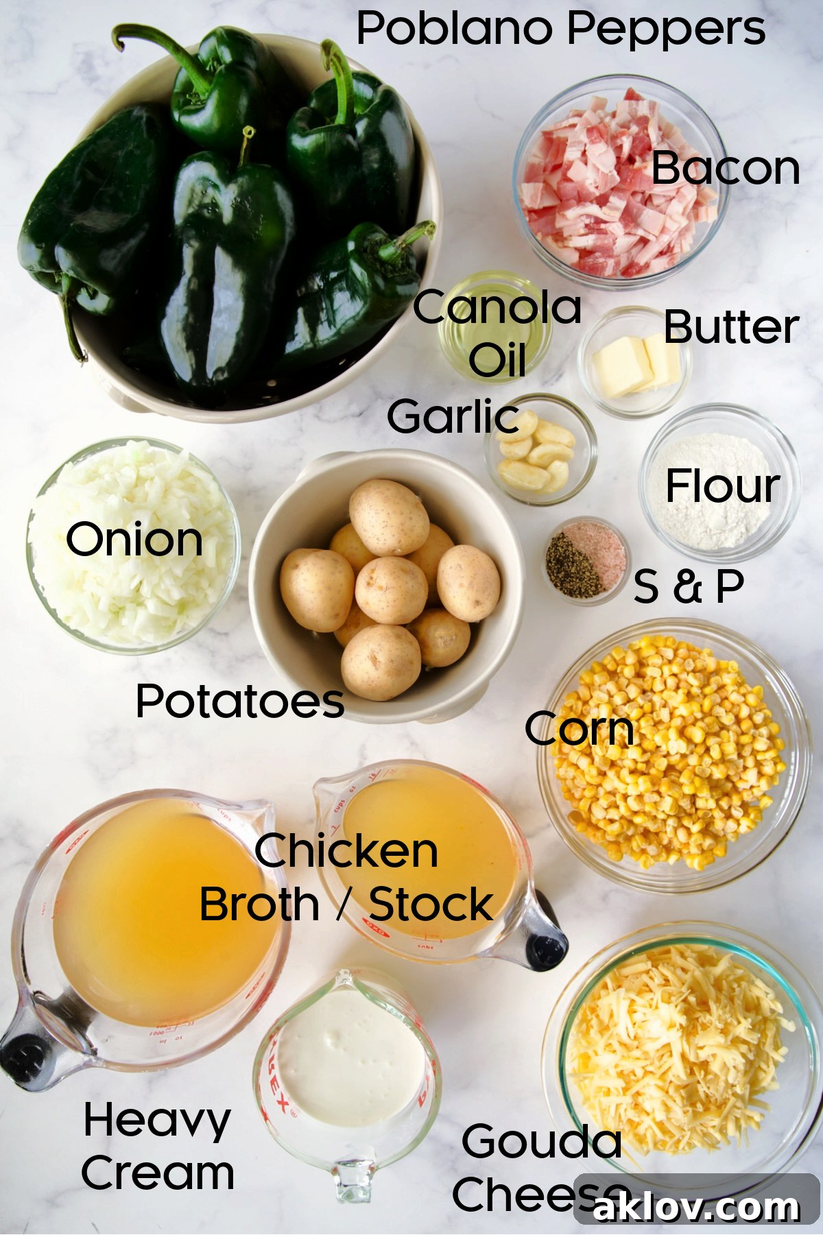 A collection of fresh ingredients for Roasted Poblano Corn Chowder arranged in small glass bowls, including chopped vegetables, bacon, and cheese.