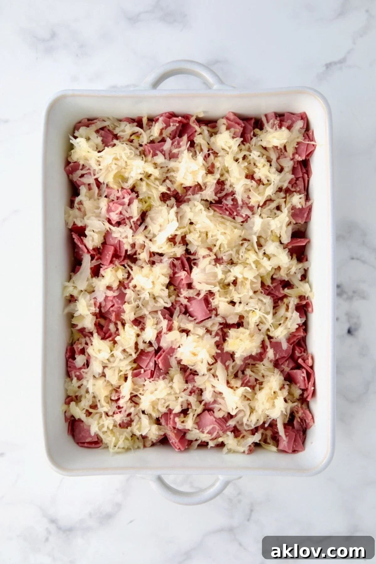 Creamy Reuben Comfort Casserole 13 The second layer of sauerkraut spread over the corned beef, adding essential tang.