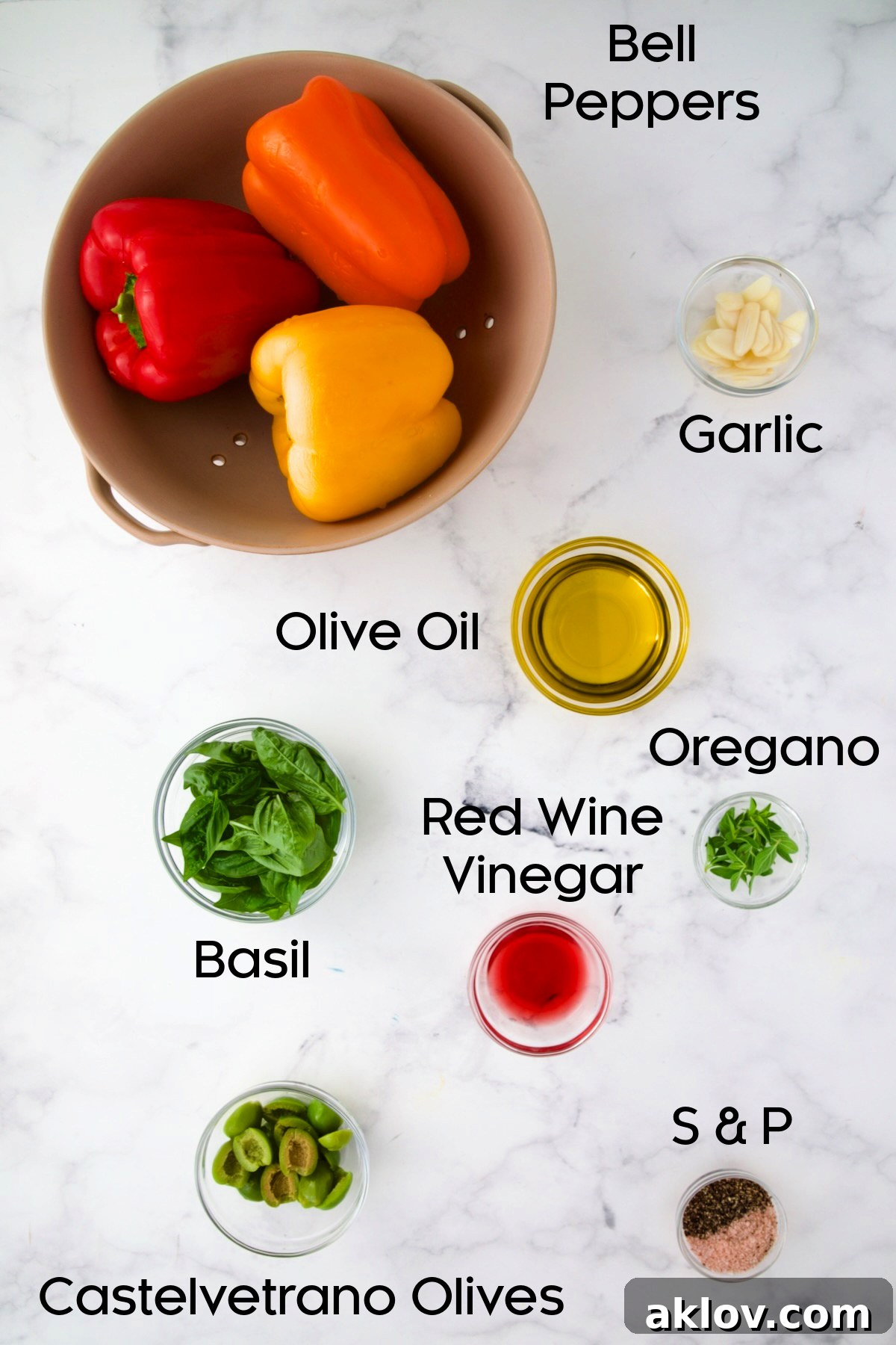 Ingredients for Roasted Pepper Salad in glass bowls.
