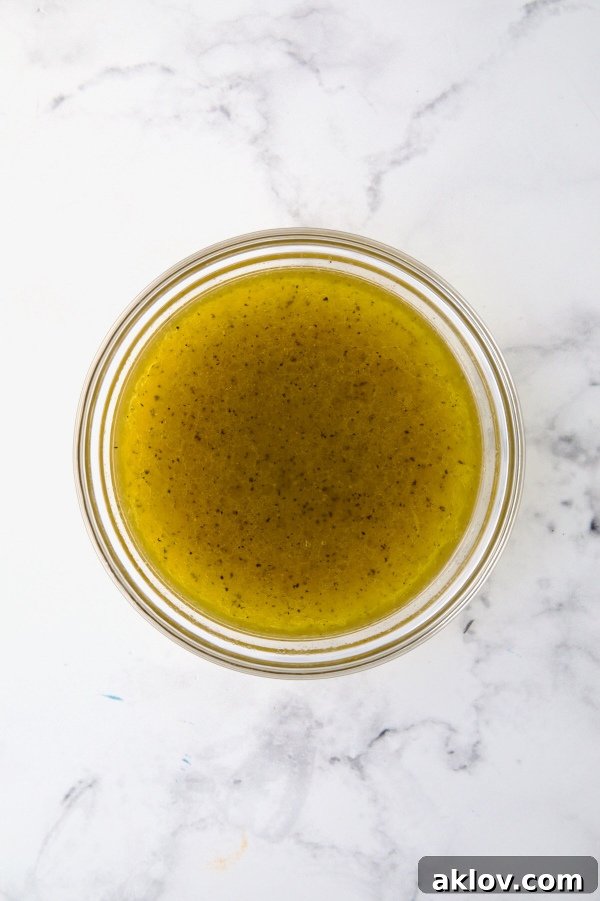 Dressing for Chicken Couscous Salad in glass bowl.