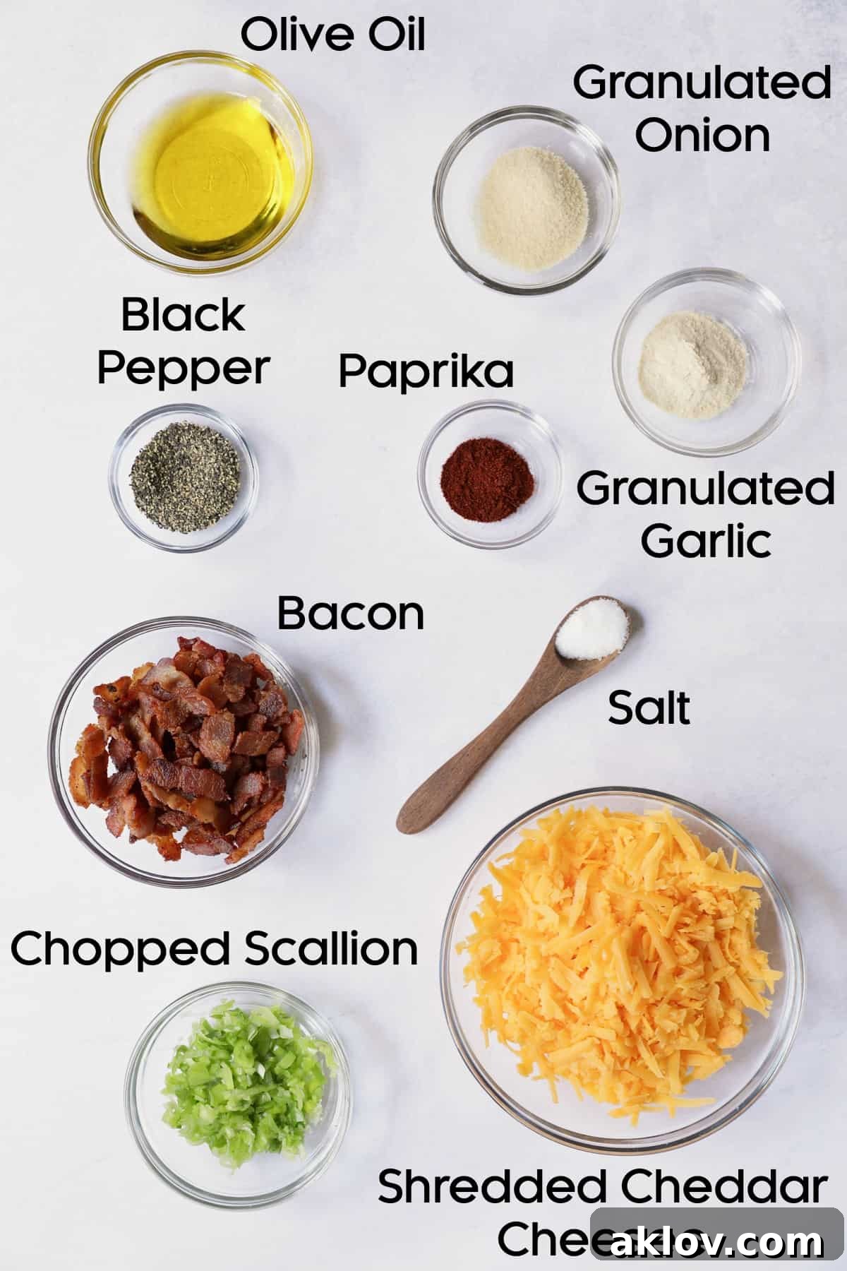Photo of ingredients for Baby Hasselback Potato Bake with Cheddar and Bacon in glass bowls.
