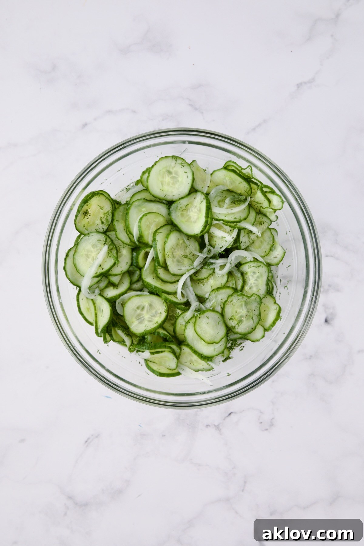The finished salad in a glass bowl after all ingredients are combined and mixed.