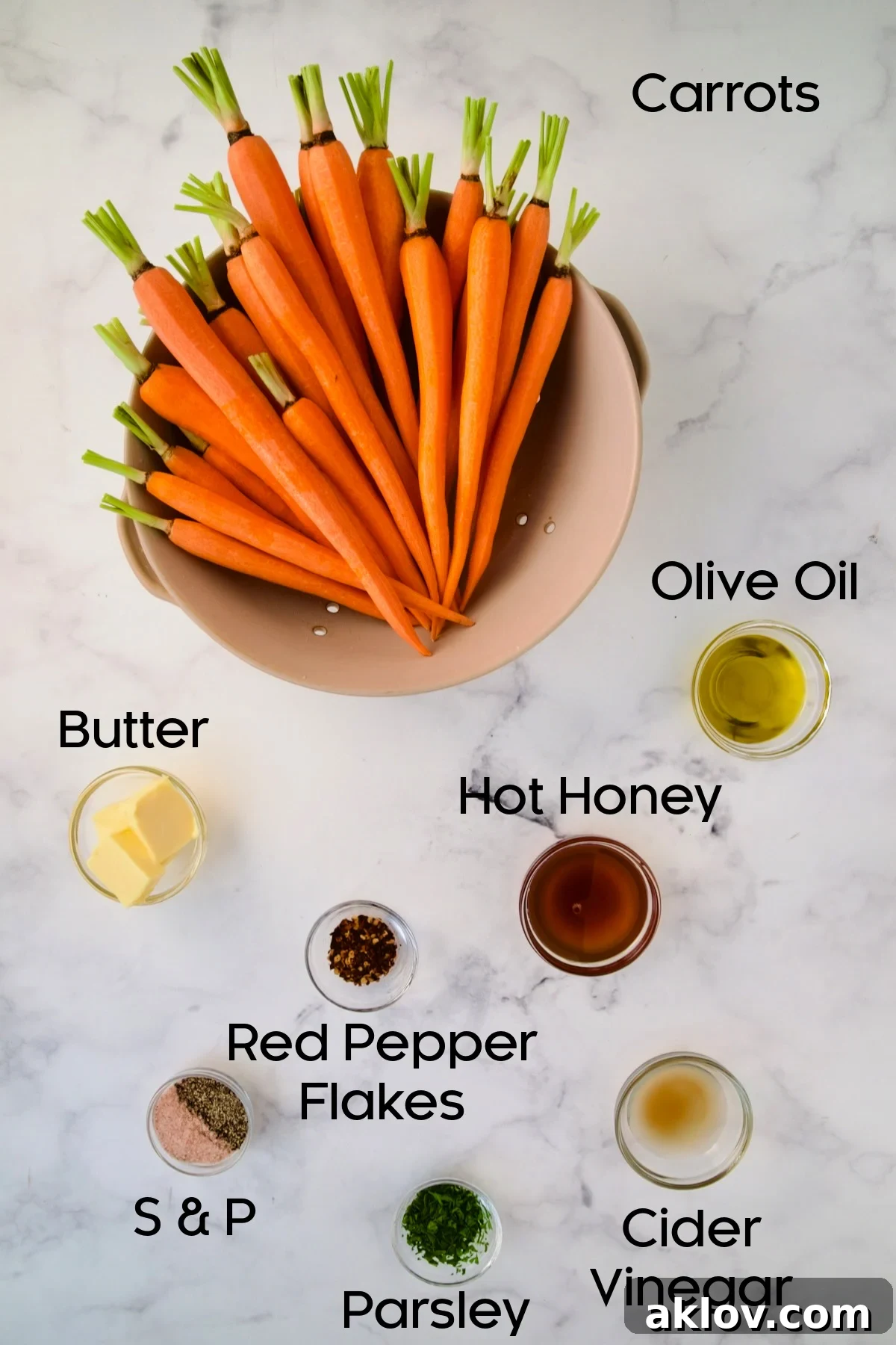 Ingredients for Hot Honey Roasted Carrots in glass bowls.