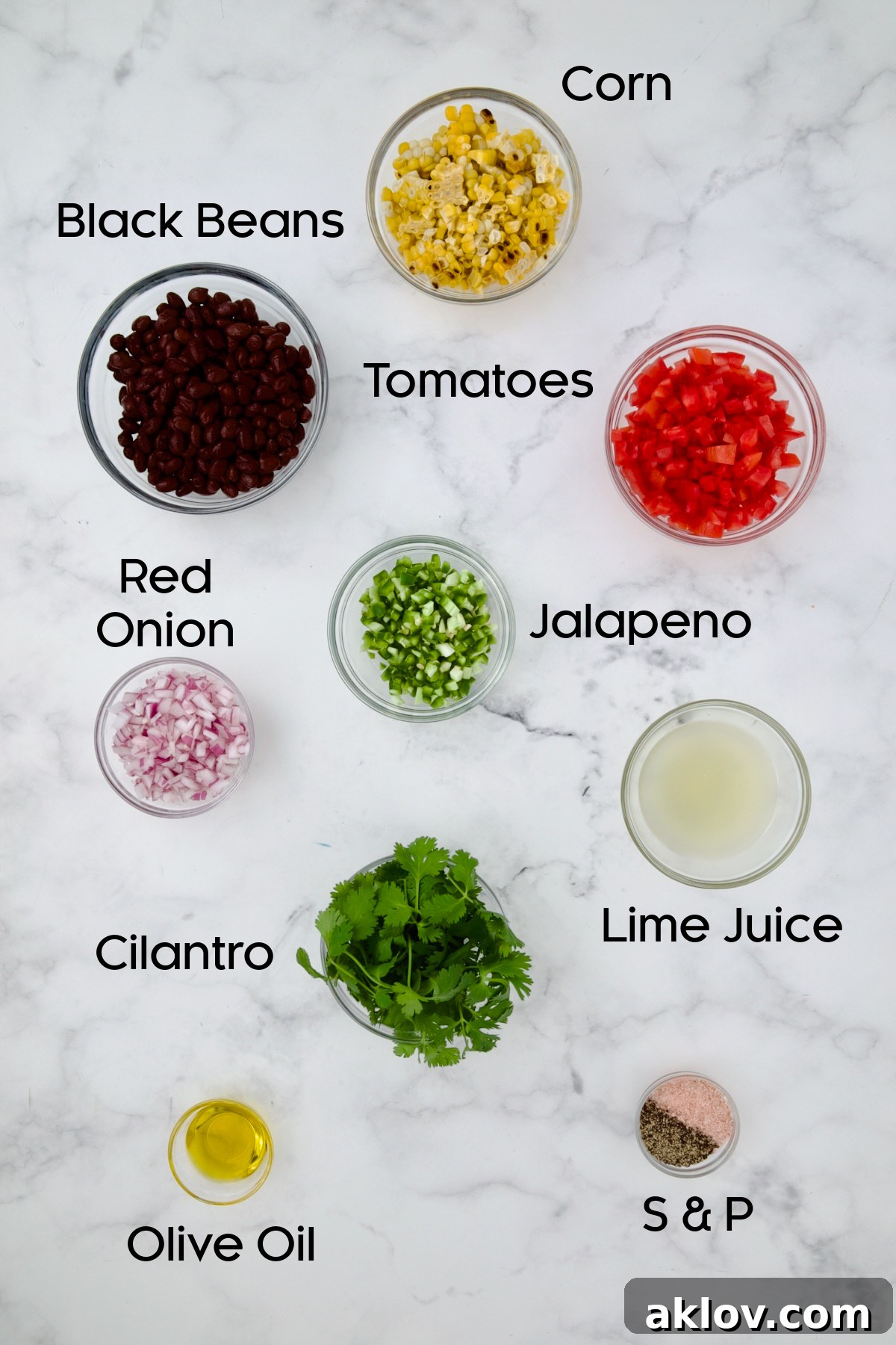 Ingredients for Black Bean Corn Tomato Salad in glass bowls.